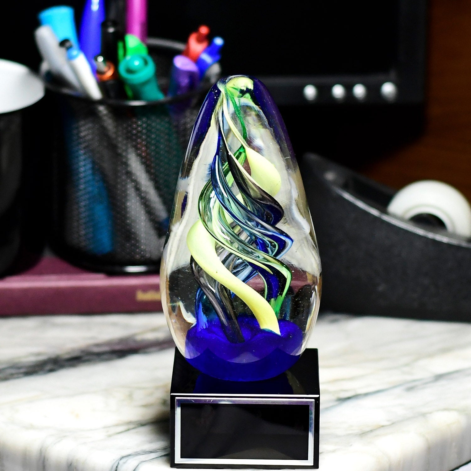 Art Glass Egg on Black Glass Base