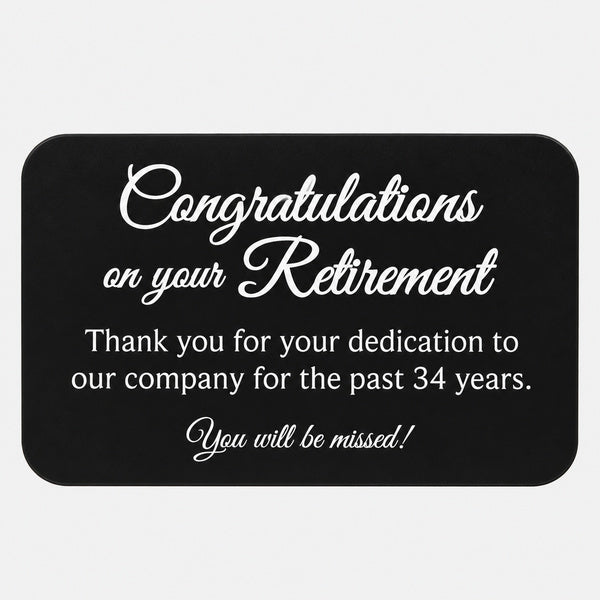 Black plastic plate with white retirement engraving and rounded corners.