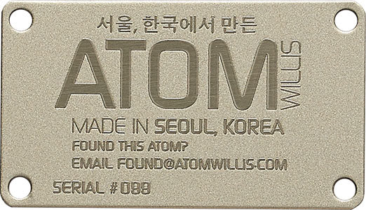 Gemini etched metal plate example with recessed lettering and four mounting holes; specialty finish shown, subject to quote.