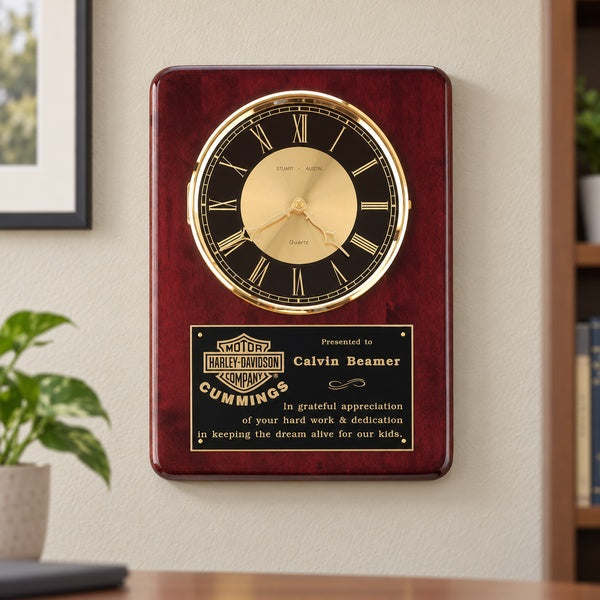 Rosewood Piano Finish Vertical Wall Clock in an office setting