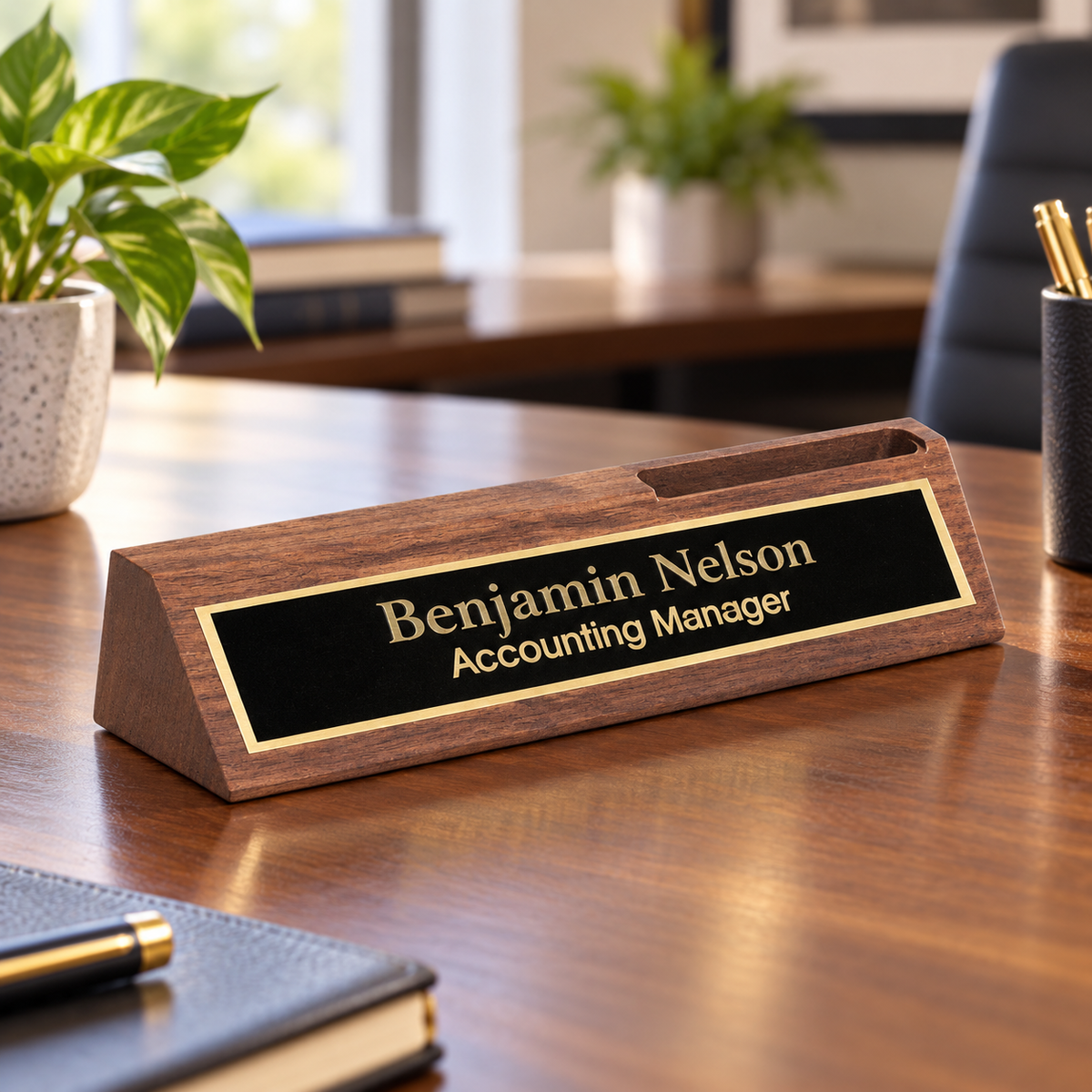 Walnut business card holder with black and gold engraved plate