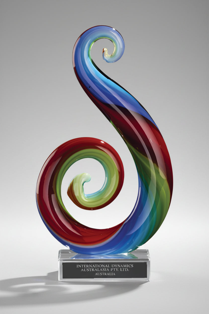 Art Glass Multi Color Curley Que on Clear Glass Base