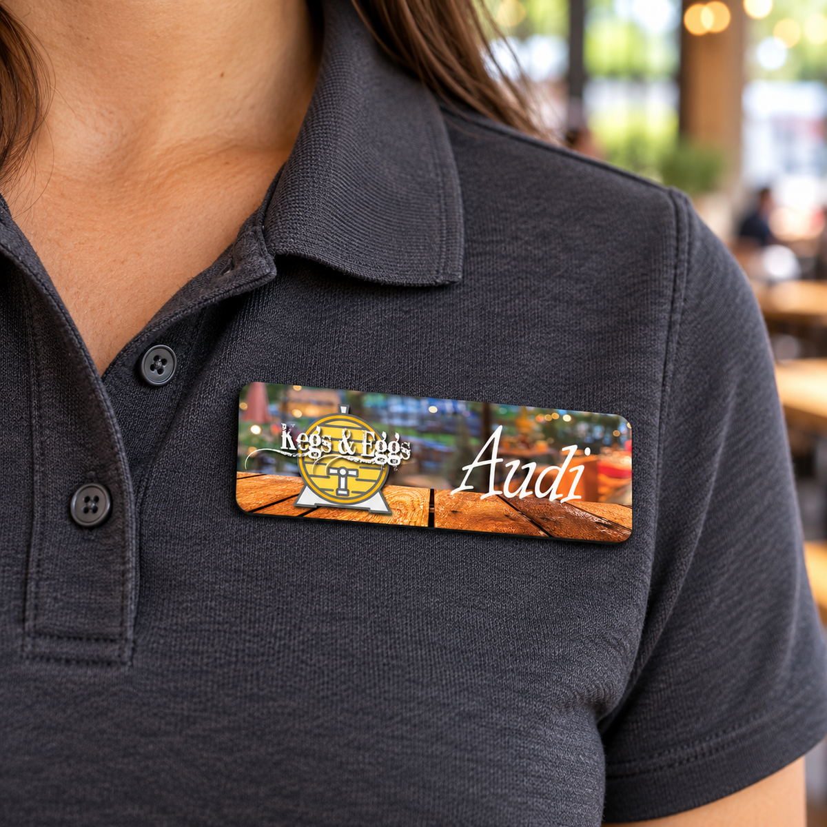 Matte Finish Plastic Name Badge worn on clothing — lifestyle example