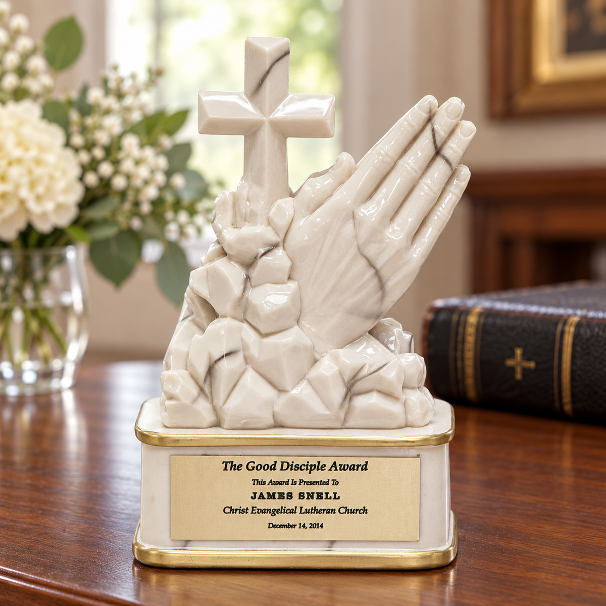 White Praying Hands Statue — realistic lifestyle setting